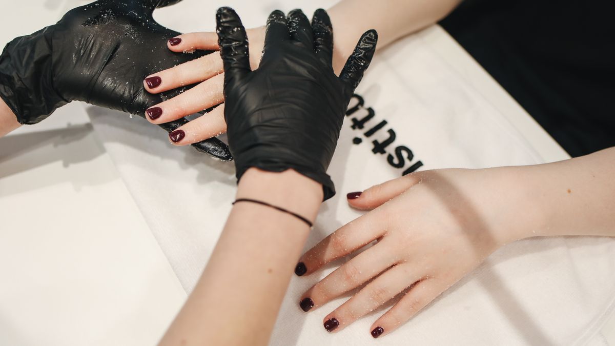 Healthy manicured nails with coconut oil cuticle balm