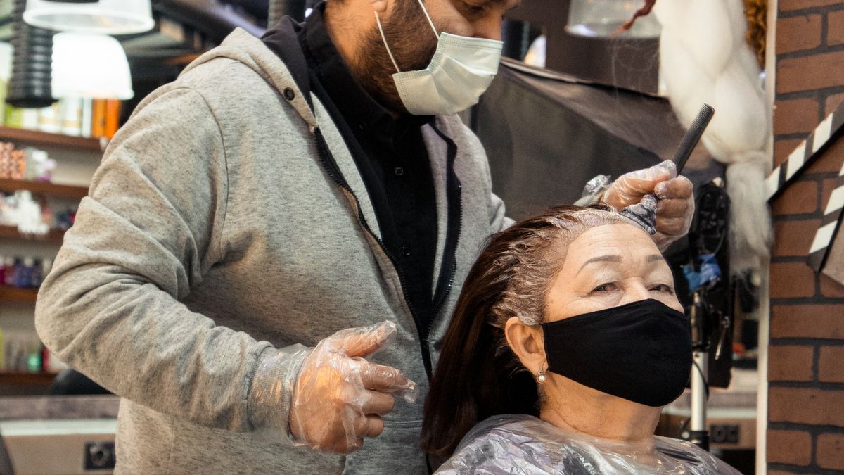 A deep conditioning coconut oil hair mask being applied