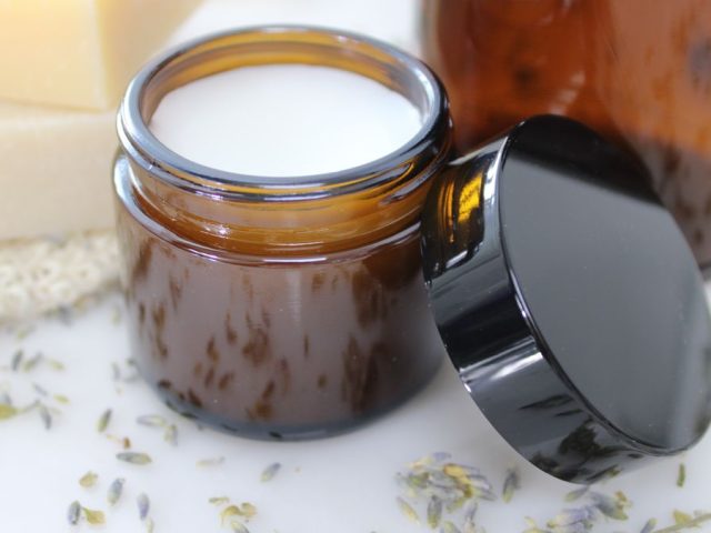 A jar of natural coconut oil vapor rub with essential oils