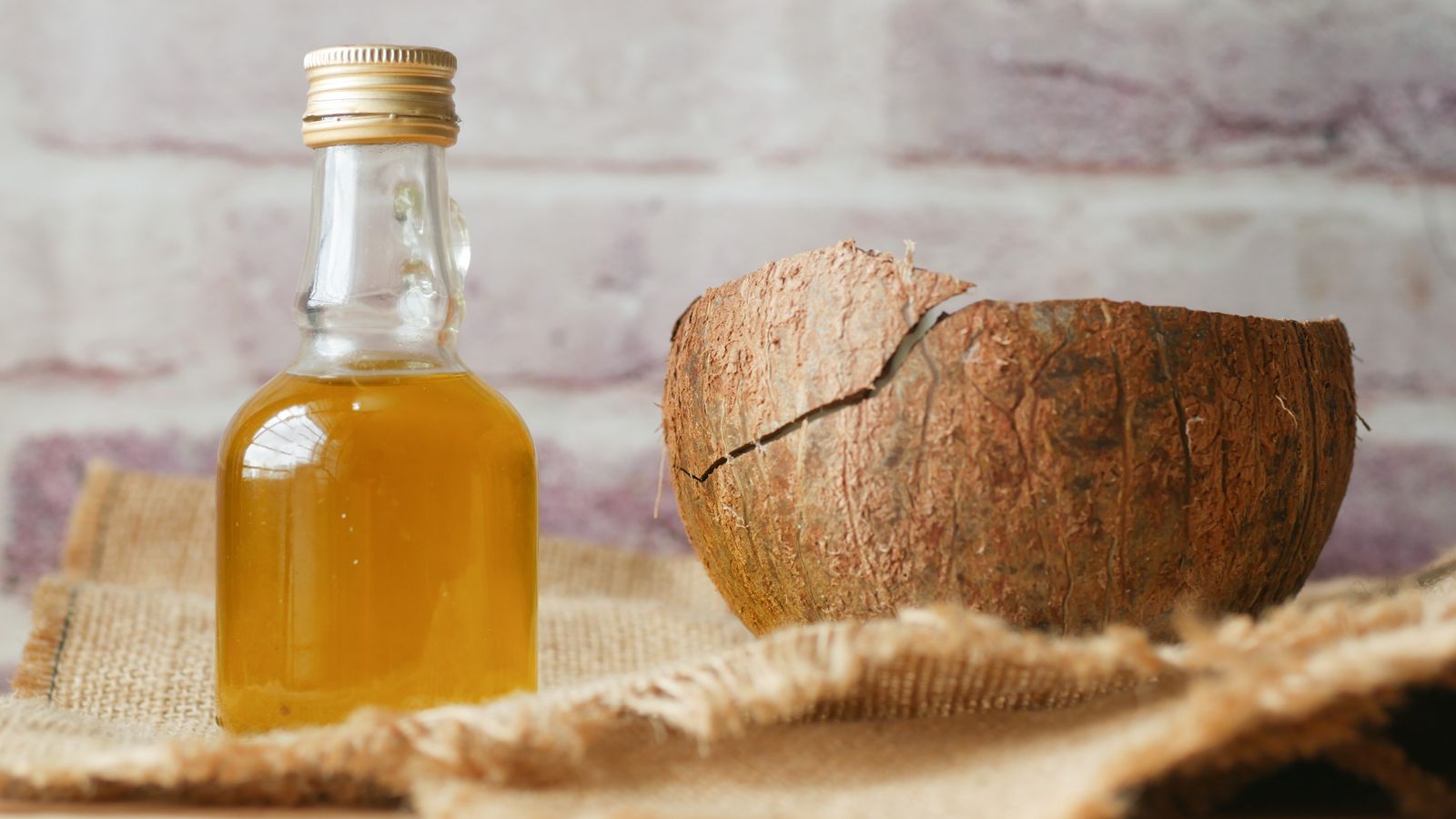 Coconut oil with a measuring tape, illustrating coconut oil and weight management
